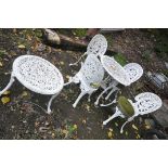 A WHITE PAINTED ALUMINIUM GARDEN TABLE 67cm in diameter, four similar chairs and similar circular