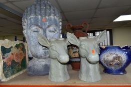 A GROUP OF SEVEN LARGE ORNAMENTS, comprising a very large Thai Buddha head, height 65cm, two plaster