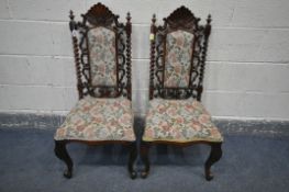 A PAIR OF VICTORIAN ROSEWOOD HALL CHAIRS, with shaped top, twin barley twist supports, on front