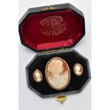 A CAMEO BROOCH AND EARRING SET, a shell cameo depicting the profile of a lady facing right with a