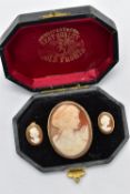 A CAMEO BROOCH AND EARRING SET, a shell cameo depicting the profile of a lady facing right with a