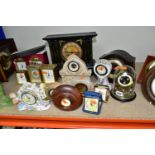 A QUANTITY OF CLOCKS, comprising a Ron Coles native Australian Red Burl wood mantel clock, a