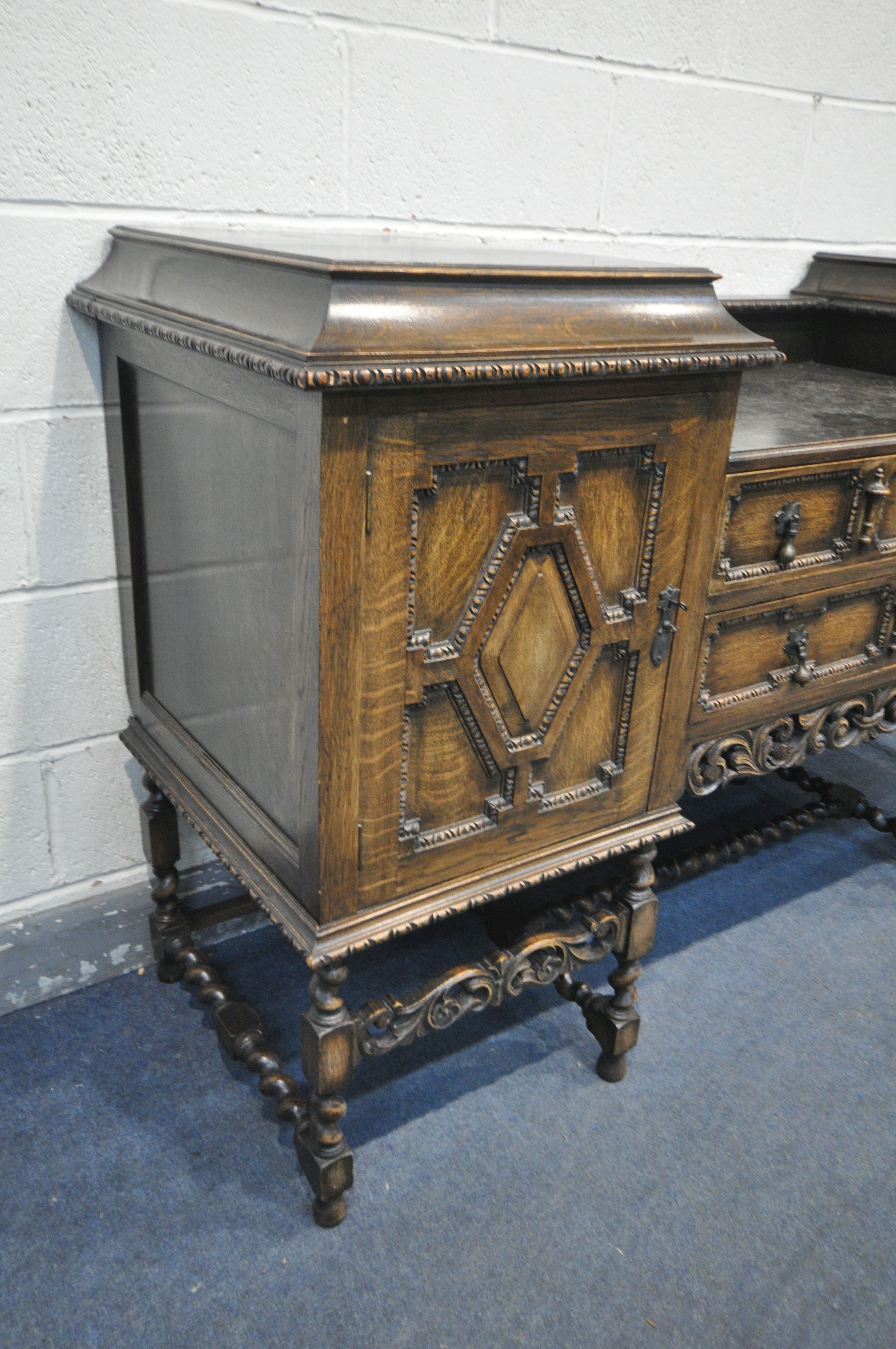 AN EARLY 20TH CENTURY OAK PEDESTAL SIDEBOARD, with geometric doors and drawers, on barley twist legs - Image 2 of 2