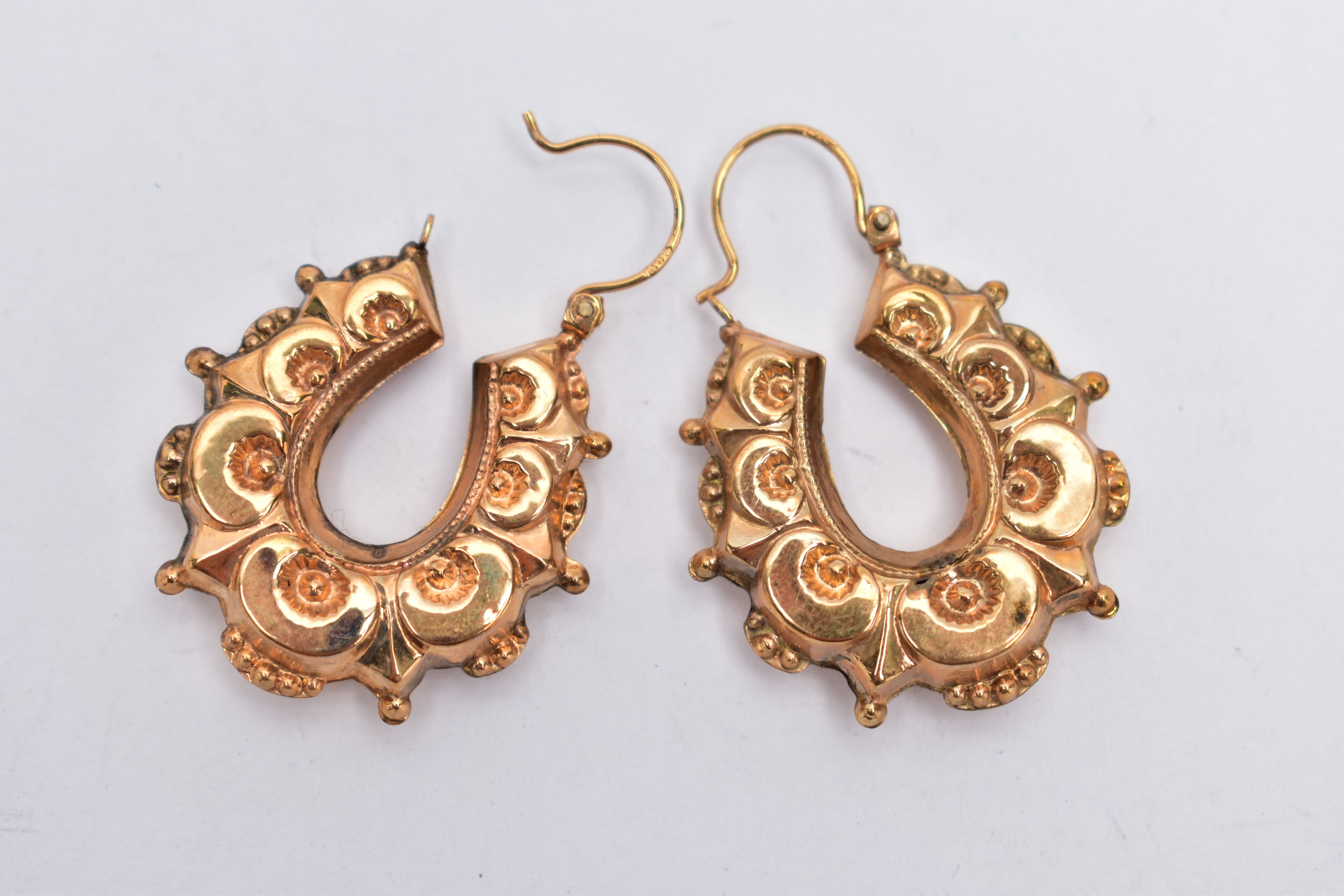A PAIR OF 9CT GOLD CREOLE HOOP EARRINGS, a pair of large hollow creole hoop earrings, fitted with