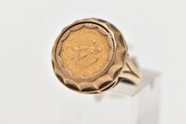 A 9CT GOLD MEXIAN COIN RING, a 1945 Dos Pesos Mexican coin set within a domed yellow gold mount,