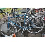 A CLAUD BUTLER MOUNTAIN BIKE with Shimano Altus 21 speed gears, 23in frame, Dynamo lights, (