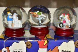 THREE BOXED COALPORT 'THE SNOWMAN' SNOW GLOBES, comprising a limited edition 'At The Party' 325/2000