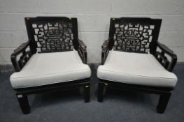 A PAIR OF ORIENTAL HARDWOOD ARMCHAIRS, with a cushion, width 67cm x depth 69cm x 82cm (2)