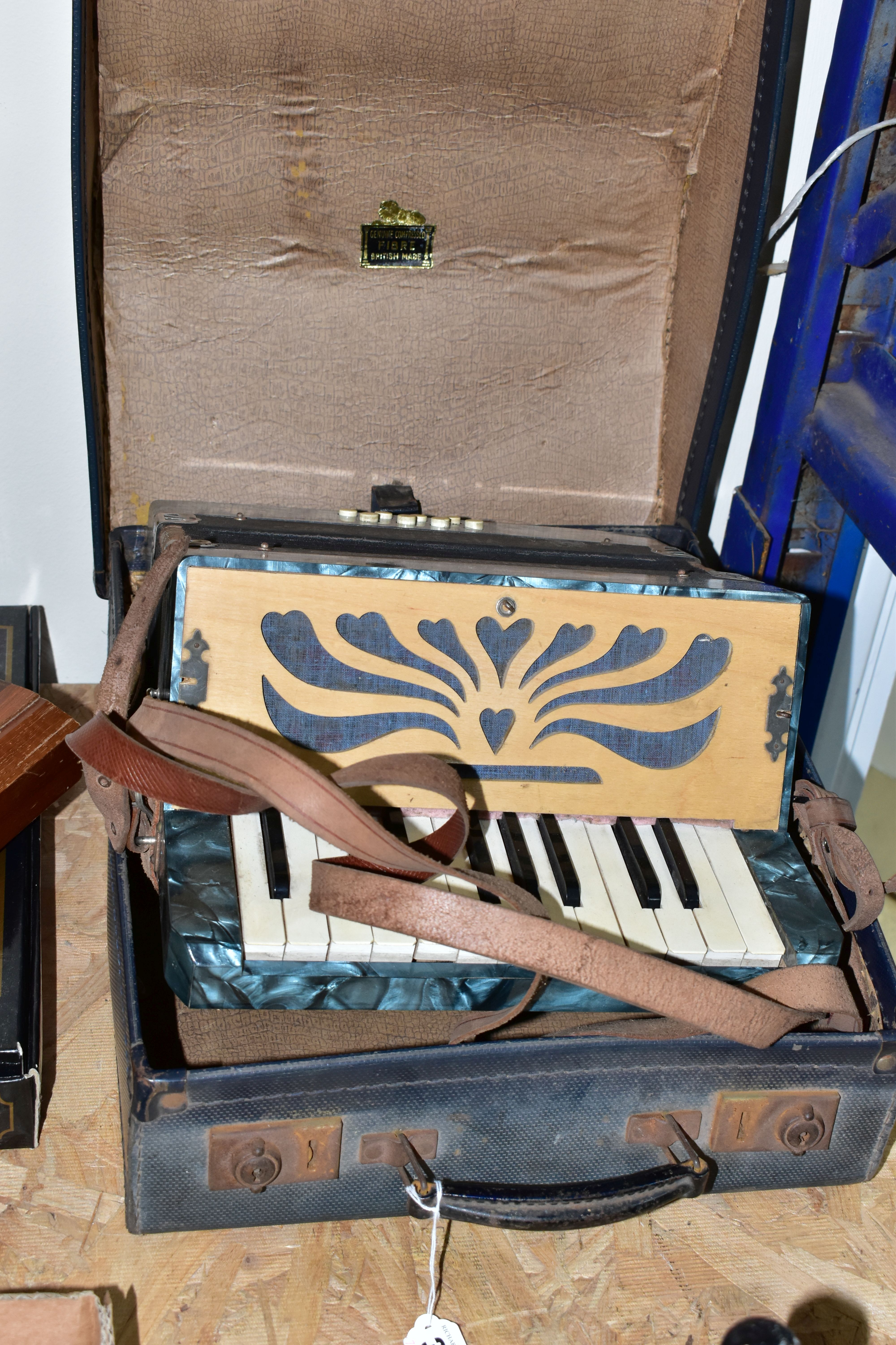 A VISSIMIO ACCORDION, with 'Piano Action' in original case (1) (Condition report: leather straps are