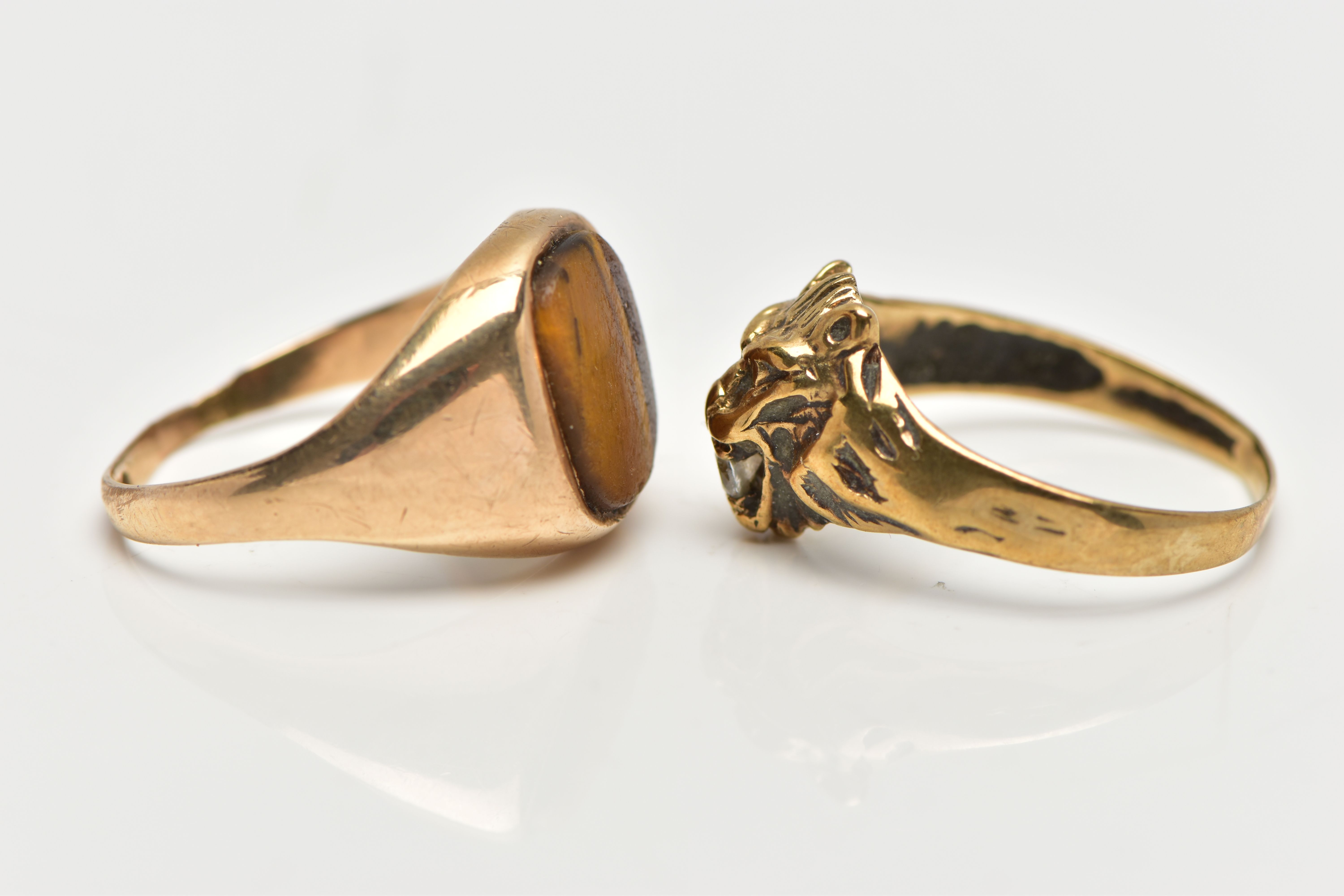 TWO 9CT YELLOW GOLD GEM SET RINGS, to include a ring designed as a lion's head, with a colourless - Image 2 of 4