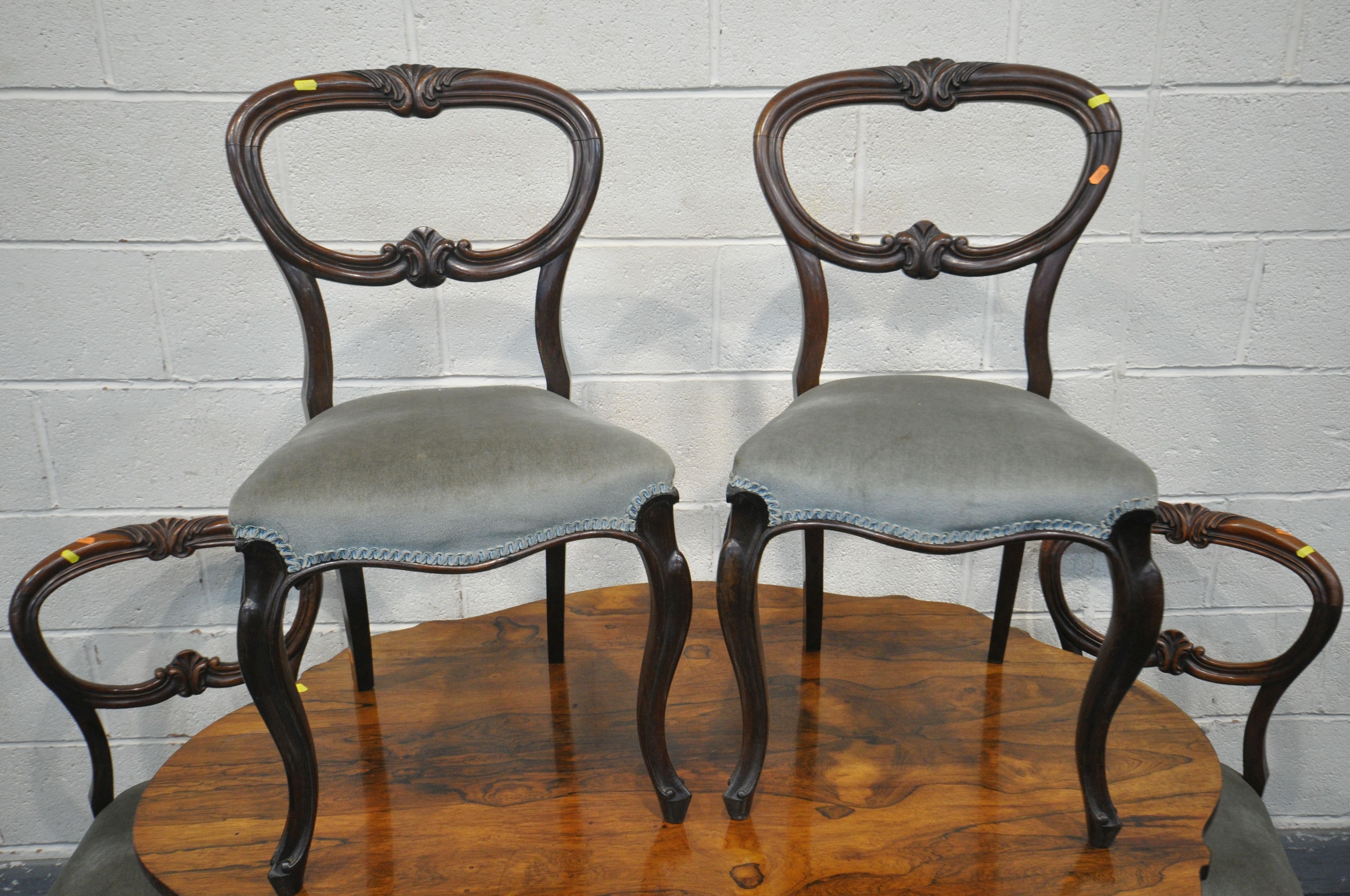 A VICTORIAN ROSEWOOD BREAKFAST TABLE, with a wavy top, on four scrolled legs and casters, length - Image 2 of 3