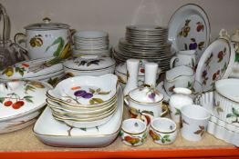 A FIFTY EIGHT PIECE ROYAL WORCESTER EVESHAM DINNER SERVICE, comprising a large twin handled
