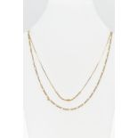 TWO CHAIN NECKLACES, the first a 9ct gold figaro chain necklace, fitted with a spring clasp,