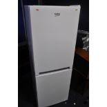 A BEKO CRFG1552W FRIDGE FREEZER measuring width 55cm x depth 57cm x height 152cm (PAT pass and