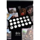 A CASED DISPLAY BY THE ROYAL MINT (A Celebration of Britain) 18 Silver proof series coins for the