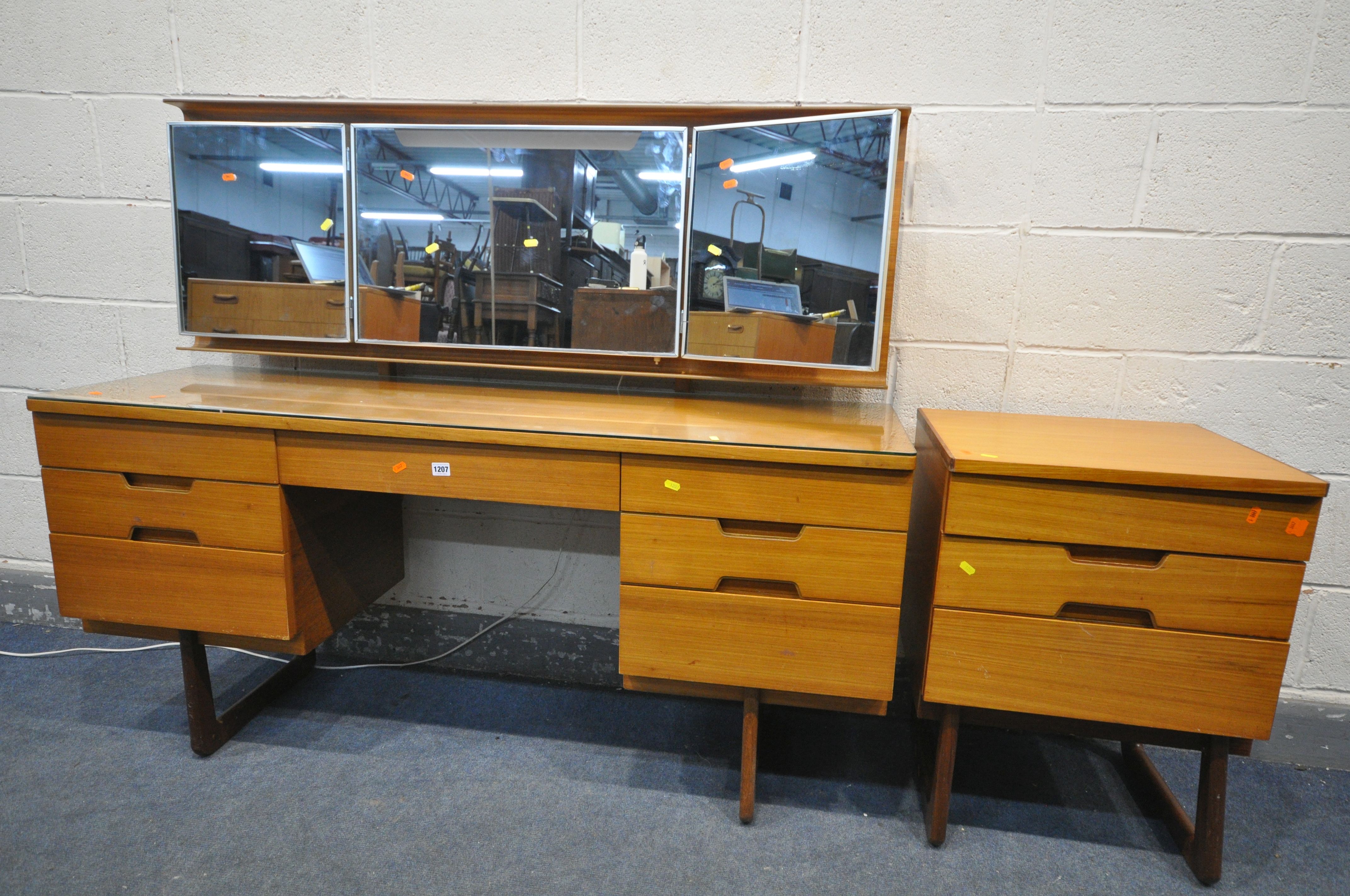 A MID CENTURY TEAK UNIFLEX DRESSING TABLE, with triple mirrors, length 153cm x depth 49cm x height