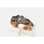 A CASED LATE VICTORIAN 9CT GOLD BLACK ENAMEL MOURNING RING, designed as a black enamel heart with