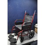 A REMPLOY WHEELCHAIR with no seat pad