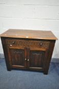 AN OAK LINENFOLD SIDEBOARD, with two drawers, width 93cm x depth 43cm x height 84cm (condition:-good