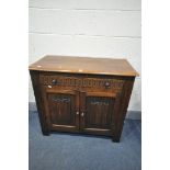 AN OAK LINENFOLD SIDEBOARD, with two drawers, width 93cm x depth 43cm x height 84cm (condition:-good