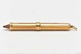 A YELLOW METAL PROPELLING PENCIL, a yellow metal case, engraved with a linear pattern and ‘LD’