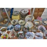 A LARGE QUANTITY OF COLLECTORS' PLATES, one hundred and three plates of which forty two are boxed,