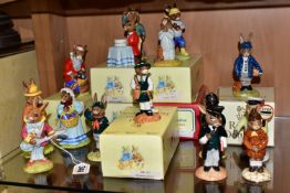 FIFTEEN ROYAL DOULTON BUNNYKINS FIGURES, comprising Mr Bunnybeat DB16, a boxed Santa Bunnykins '