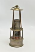AN EARLY 20TH CENTURY BRASS, COPPER AND PEWTER BELGIAN MINERS LAMP, fitted with a hanging hook,
