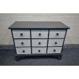 A BESPOKE PAINTED SIDEBOARD/CHEST OF NINE DRAWERS, on bracket feet, width 99cm x depth 45cm x height