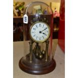 A GLASS DOMED ANNIVERSARY CLOCK, columns, crown and pendulum with brass application , wooden