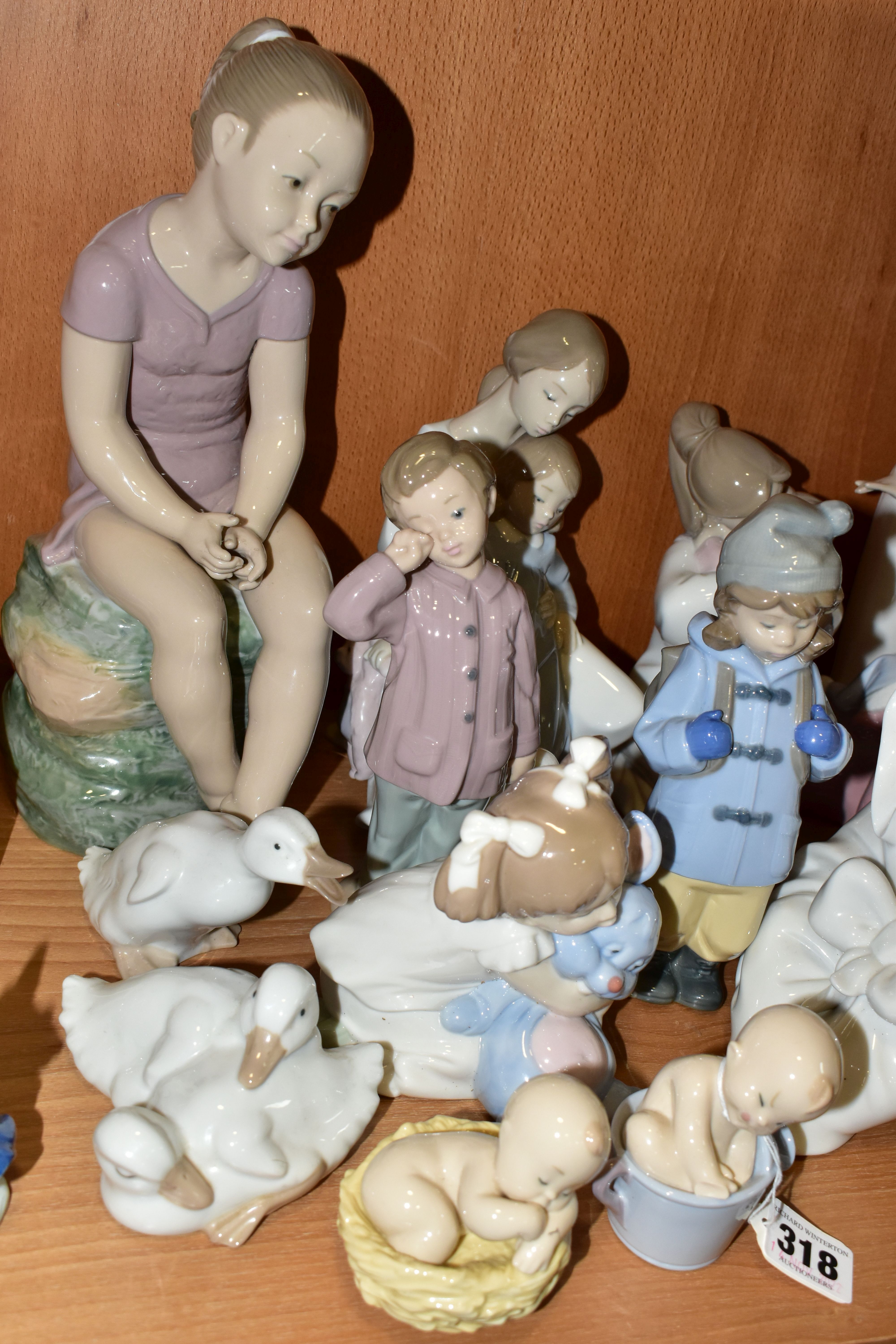 SIXTEEN LLADRO NAO FIGURINES, comprising four figures from the Where Do Babies Come From - Image 4 of 7