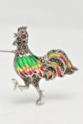 A WHITE METAL PLIQUE A JOUR BROOCH, in the form of a cockerel, marcasite detail to the body with a