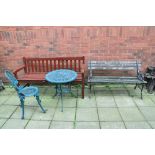 A WOODEN SLATTED HARDWOOD GARDEN BENCH 154cm wide, a garden bench with cast iron ends, slatted
