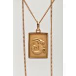 A YELLOW METAL CAPRICORN STAR SIGN PENDANT NECKLACE, the pendant of a rectangular form depicting the