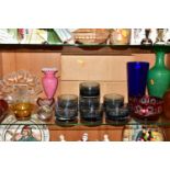 A GROUP OF COLOURED AND DECORATIVE GLASS WARES, to include a boxed set of seven smoky blue bowls