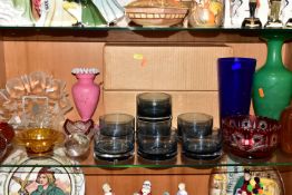 A GROUP OF COLOURED AND DECORATIVE GLASS WARES, to include a boxed set of seven smoky blue bowls