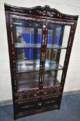 A 20TH CENTURY CHINESE GLAZED TWO DOOR DISLPAY CABINET, enclosing two glass shelves, with two