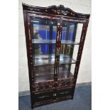 A 20TH CENTURY CHINESE GLAZED TWO DOOR DISLPAY CABINET, enclosing two glass shelves, with two