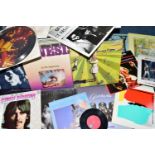 A COLLECTION OF OVER SEVENTY LPs AND 12in SINGLES by artists such as Genesis, Pink Floyd, Queen,