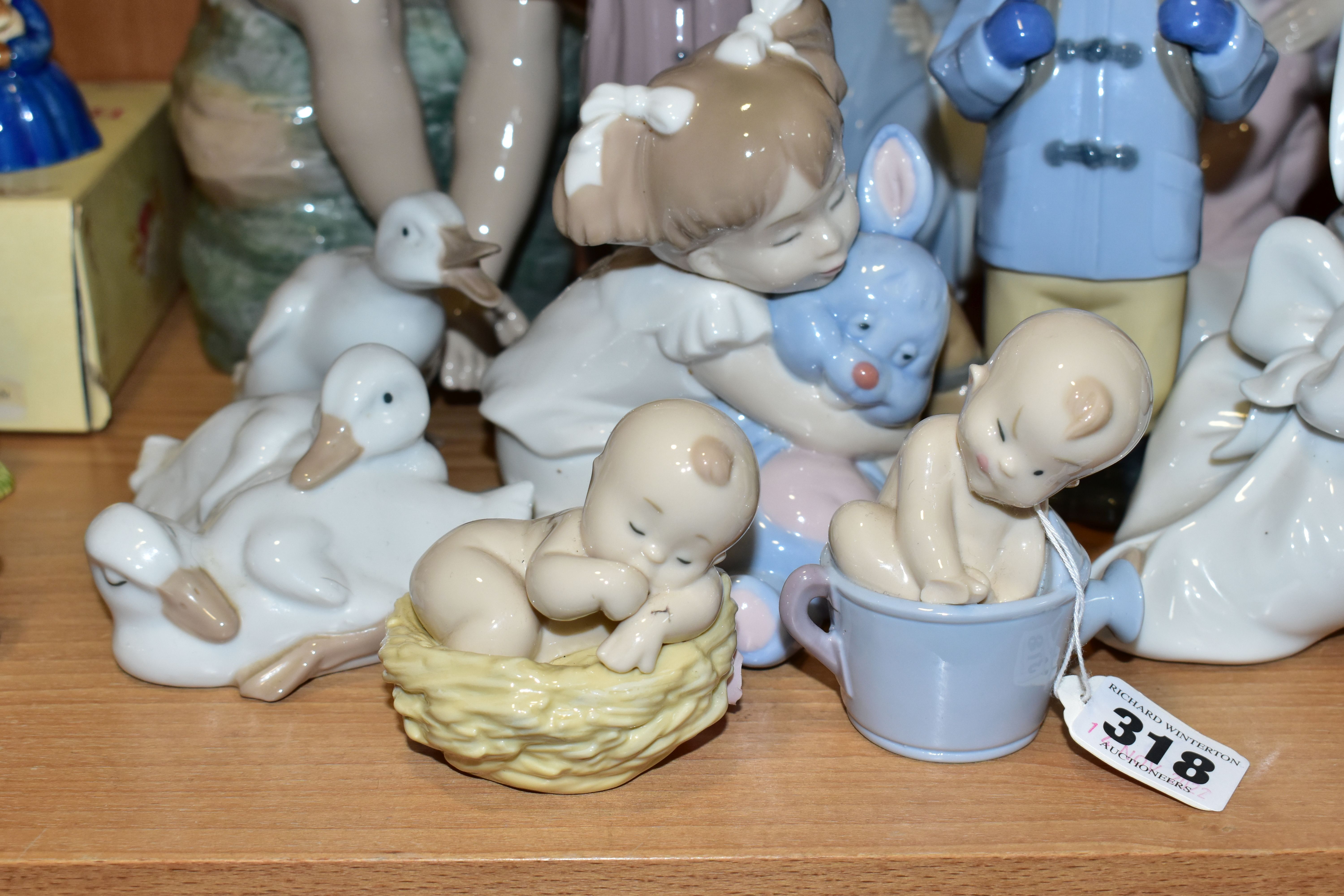 SIXTEEN LLADRO NAO FIGURINES, comprising four figures from the Where Do Babies Come From - Image 3 of 7