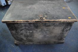 A VINTAGE WOODEN CHEST containing vintage tools, pry bars, brackets, large hammers, clamps etc.