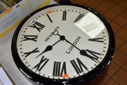 WALL CLOCK, a circular battery powered wall clock with Roman numerals, inscribed Newgate London,