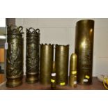 A GROUP OF TRENCH ART, comprising two small shells, height 14cm and 18cm, a matching pair of shell