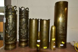 A GROUP OF TRENCH ART, comprising two small shells, height 14cm and 18cm, a matching pair of shell