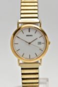 A 9CT GOLD 'SEIKO' WRISTWATCH, a quartz movement, round white dial, signed 'Seiko', baton markers,