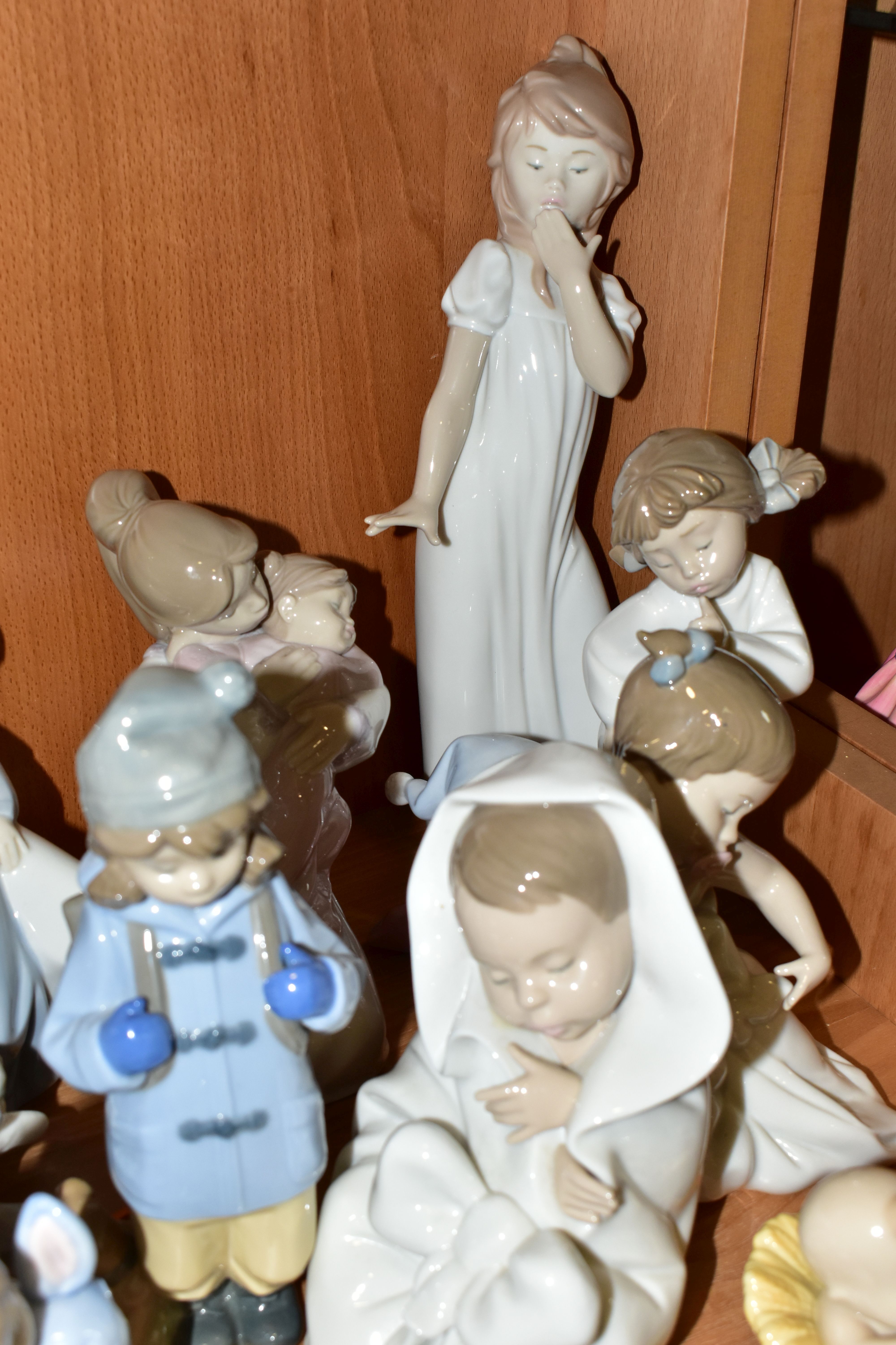 SIXTEEN LLADRO NAO FIGURINES, comprising four figures from the Where Do Babies Come From - Image 6 of 7