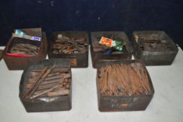 SIX TINS OF VINTAGE TOOLS to include files, spanners, chisels, hand taps, nails, screw etc.