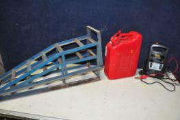 A PAIR OF VEHICLE RAMPS (brand and max weight UNKNOWN) along with a Halfords battery charger (PAT