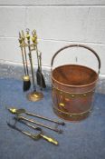 A COPPER AND BRASS COAL BUCKET, a brass companion set, copper warming pan and two spare forks (5)