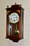 A COMITTI OF LONDON WALL CLOCK, Westminster chimes with pendulum and key, white chapter ring and